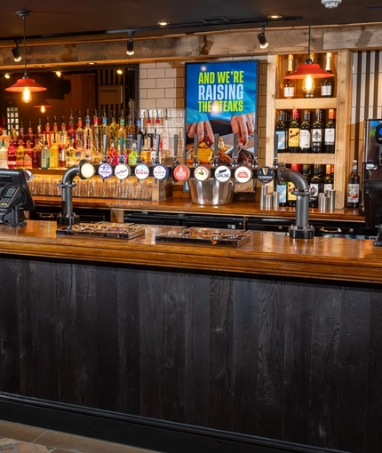 The interior bar area showing several pump clips advertising Strongbow, Strongbow Dark Fruits, San Miguel, Coors, Peroni, Madri, Birra Moretti, Carling, Stella Artois and Guinness all available at the Man of Gwent.  