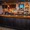 The interior bar area showing several pump clips advertising Strongbow, Strongbow Dark Fruits, San Miguel, Coors, Peroni, Madri, Birra Moretti, Carling, Stella Artois and Guinness all available at the Man of Gwent.  