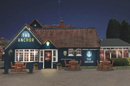 A render of the outside of a pub.