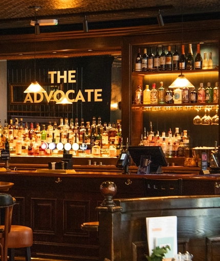 The bar and interior restaurant seating area of The Advocate in Edinburgh.
