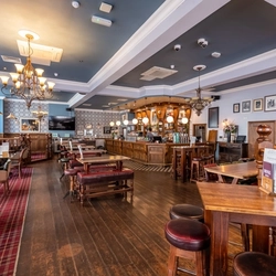The restaurant area at the Blue Posts, with the bar in the background.