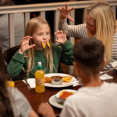 A family eating together in a pub restaurant