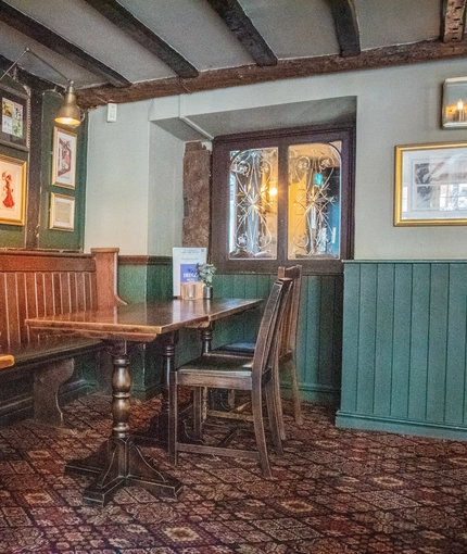Internal seating area in a pub restaurant