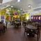 interior restaurant and seating area with a play area