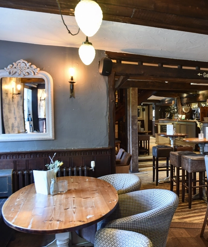 The bar and seating areas of The Bear Inn.