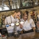 Team members at the bar