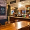 interior seating area and bar of the pub