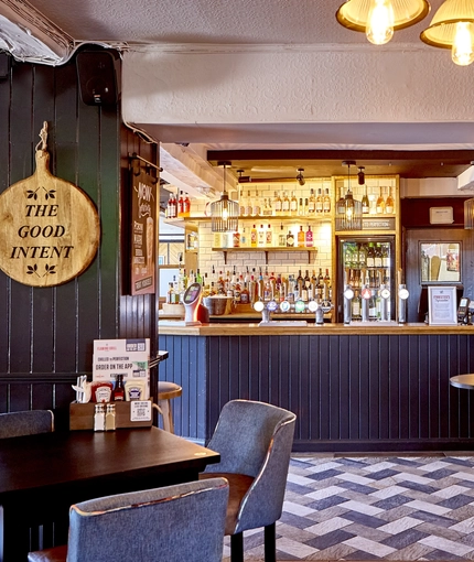 The bar and interior restaurant seating area at The Good Intent in Hornchurch.