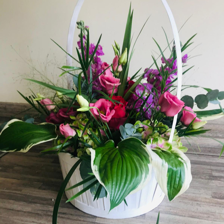 An image of a basket of flowers advertising a Mothers Day Bouquet Workshop what's on event at The Boat.