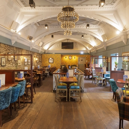 The interior restaurant seating area at The Wild Boar.