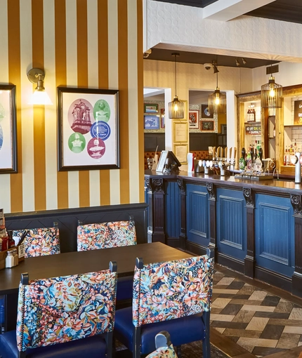 The interior bar and restaurant seating area at The Yacht.