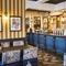 The interior bar and restaurant seating area at The Yacht.