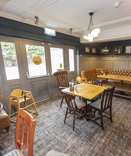 Interior dining area of a pub.