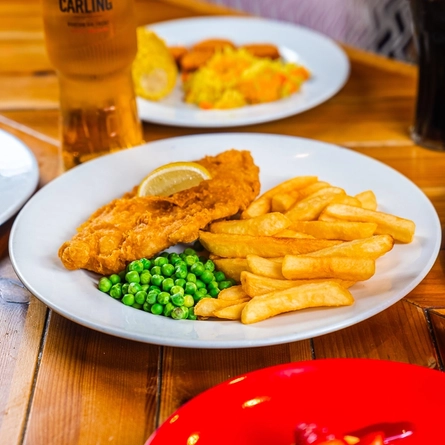 Fish and chips on a plate.