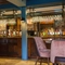 An image of the interior bar and seating area at The Guild.