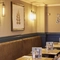The interior restaurant seating area at The Caledonian Hotel.