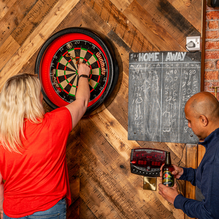 GK_PL_People_Lifestyle_Two_People_Playing Darts_SS24_2024_2.jpg