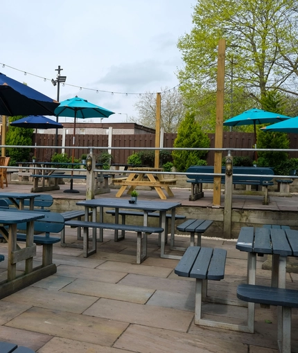 An exterior shot of the beer garden & seating area at the Sitwell Arms in Whiston.