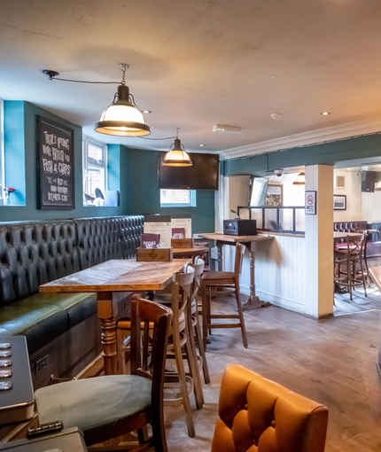 Internal seating area in a pub restaurant