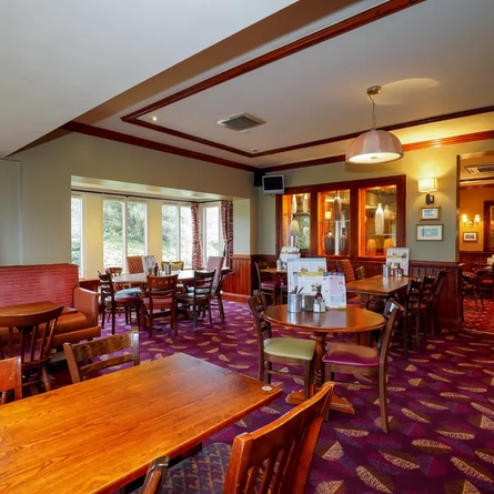Interior dining area of a pub.
