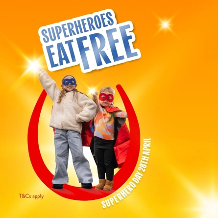 A banner saying "Superheroes Eat Free" as part of the Superhero Day promotion at Hungry Horse venues.