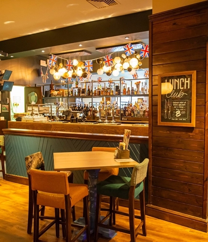 interior restaurant, seating area and a bar