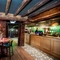 Interior bar area with feature fireplace