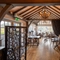 Interior restaurant with nice decor and curtain down the middle of the room