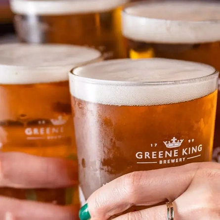 Pints of Greene King beers