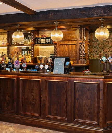 The wood panelled bar inside the Smiths Arms pub in Beckwithshaw.