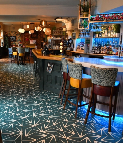 interior seating area and bar of the pub