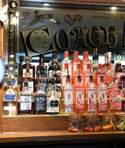 Spirits bottles behind bar