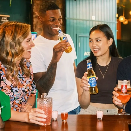 Friends enjoying drinks in the pub