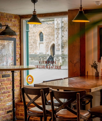 Internal seating area, next to the window at the George Abbot.