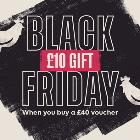 A Banner promoting 'Black Friday Live' at Flaming Grill venues.