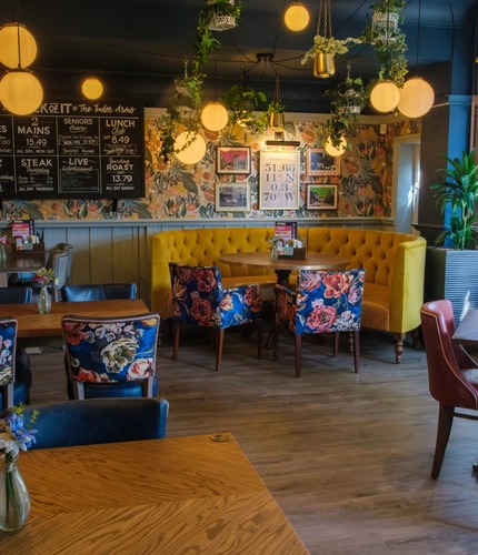 the interior restaurant and seating area at the Tudor Arms.