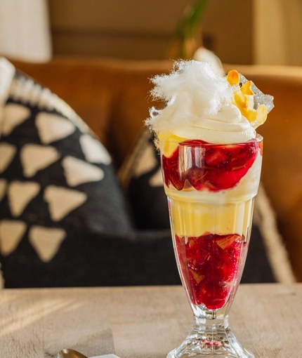 A rhubarb custard knickerbocker glory dessert served at Crafted Venues.