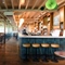 The bar and a seating area inside The Grain and Hop Store.