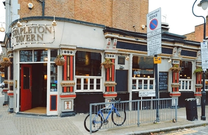 The exterior facade and footpath alongside The Stapleton Tavern.