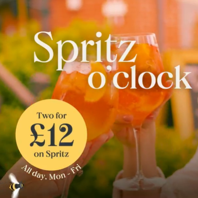 A banner promoting the 'Summer Spritz' offer available at Chef & Brewer venues.