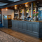 The interior bar with embossed panelling and wooden flooring at The Spice Island.