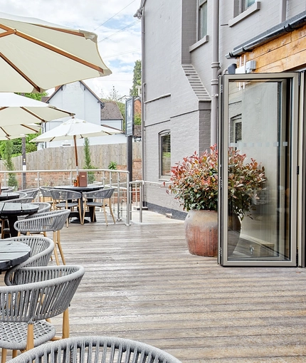 The Four Oaks - Exterior seating area and beer garden