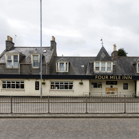The exterior facade of The Four Mile Inn.