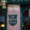 A close up image of an exterior historical information plaque with the wording "The Old Crypt AD 1180" at The Watergates Bar.