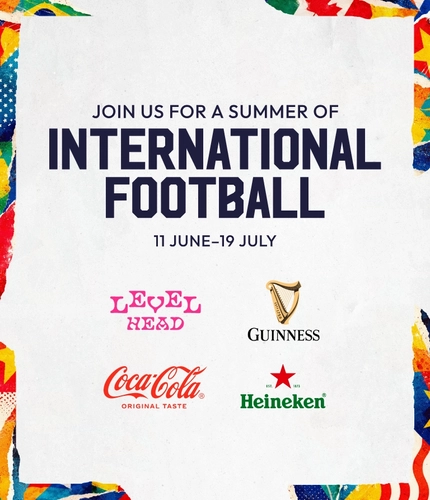 A banner promoting the World Cup at Flaming Grill and Community venues.