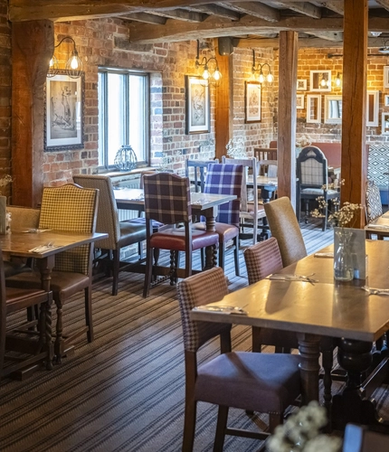 The interior restaurant seating area at The Green Dragon.