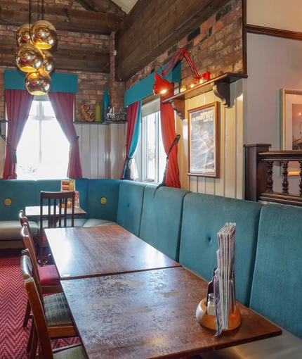 Interior dining area of a pub.