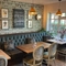 an interior restaurant and seating area