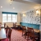 Interior dining area of a pub.