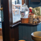 An interior image focusing on a Dog Station with dog treats, blankets and water dispenser at The Spice Island.